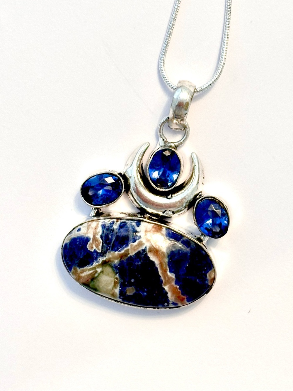 Beautiful, 1 1/2 inch, Long Sodalite and Blue Topaz pendant on a silver chain.